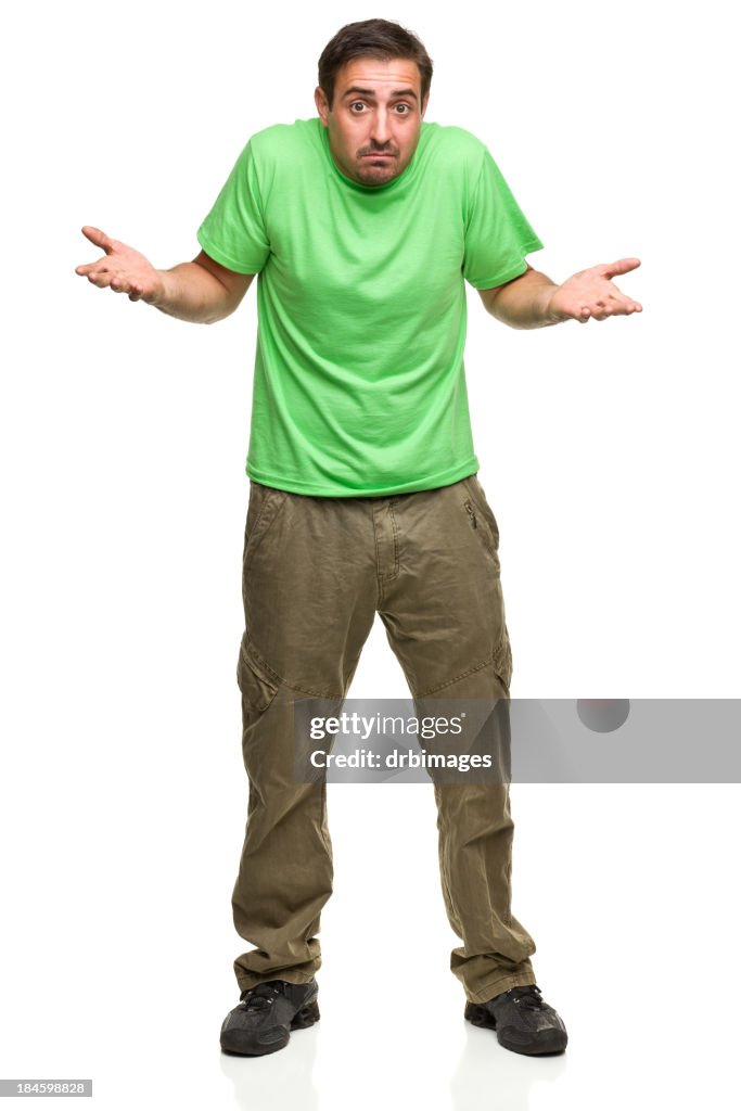 Scruffy man in green t-shirt, shrugging, with palms up