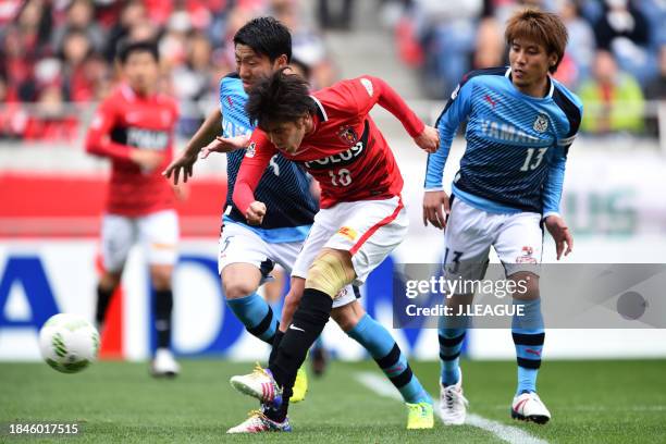 Yosuke Kashiwagi of Urawa Red Diamonds scores the team's first goal during the J.League J1 first stage match between Urawa Red Diamonds and Jubilo...