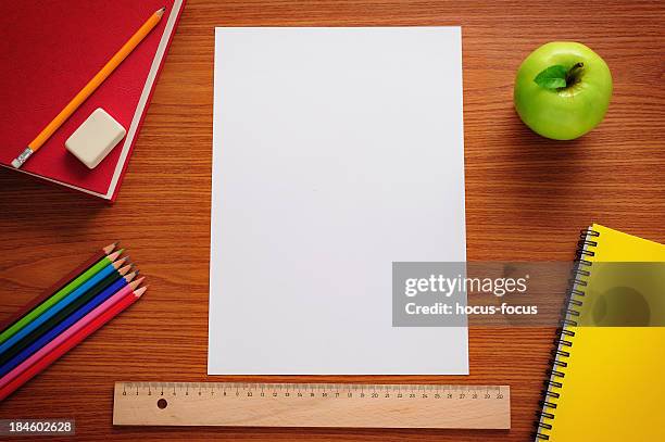 blank paper on desk - school supplies on desk stock pictures, royalty-free photos & images