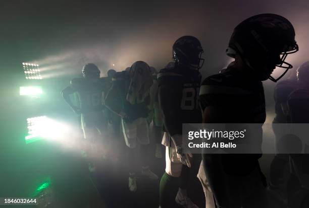 The New York Jets prepare to take the field prior to the game against the Houston Texans at MetLife Stadium on December 10, 2023 in East Rutherford,...