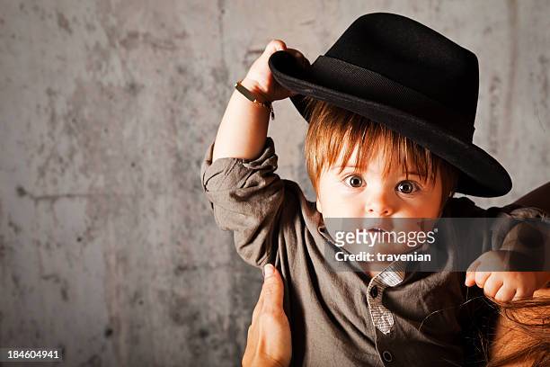 child in a big hat - big head bildbanksfoton och bilder
