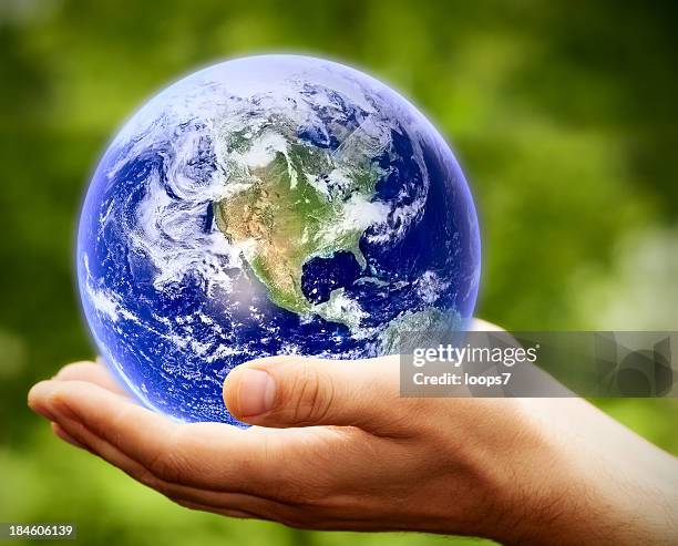 earth in hands - trust god stock pictures, royalty-free photos & images