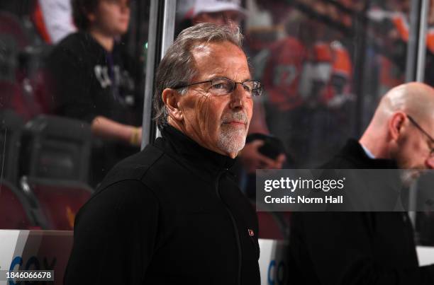 Head coach John Tortorella of the Philadelphia Flyers looks on from the bench during a game against the Arizona Coyotes at Mullett Arena on December...