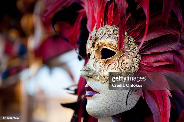 venetian red carnival mask, venice, italy - red feather stock pictures, royalty-free photos & images