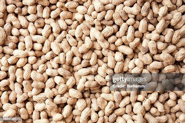 peanuts background - peanuts stock pictures, royalty-free photos & images