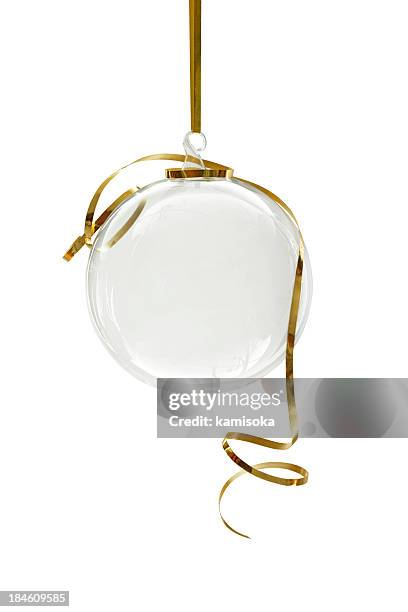 transparent christmas ornament hanging on a white background - doorzichtig stockfoto's en -beelden
