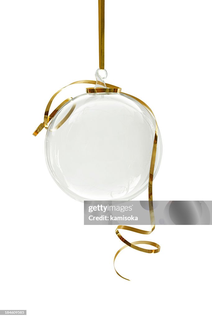 Transparent Christmas ornament hanging on a white background