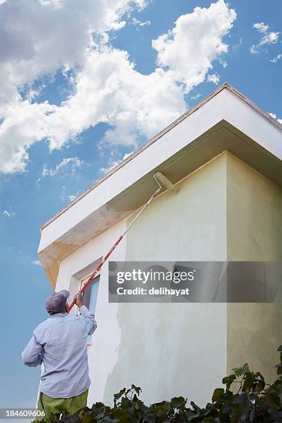 painter - painting house exterior stock pictures, royalty-free photos & images