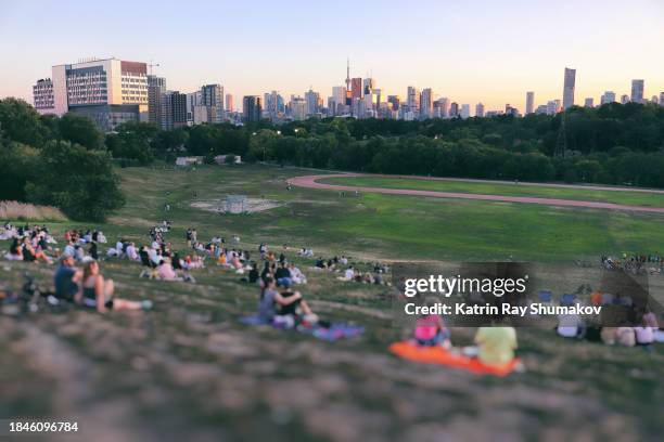 traditional sunset watching in the riverdale park of toronto - riverdale stock pictures, royalty-free photos & images