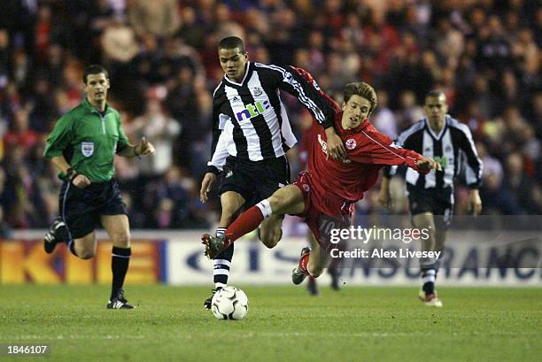 Juninho of Middlesbrough is tackled by Jermaine Jenas of Newcastle United during the FA Barclaycard Premiership match held on March 5, 2003 at the...