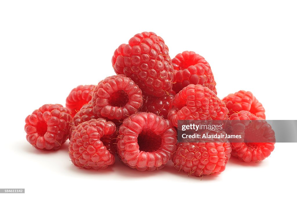Bunch of raspberries on white background