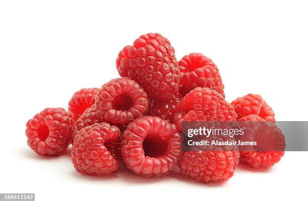 bunch of raspberries on white background - red berry stock pictures, royalty-free photos & images