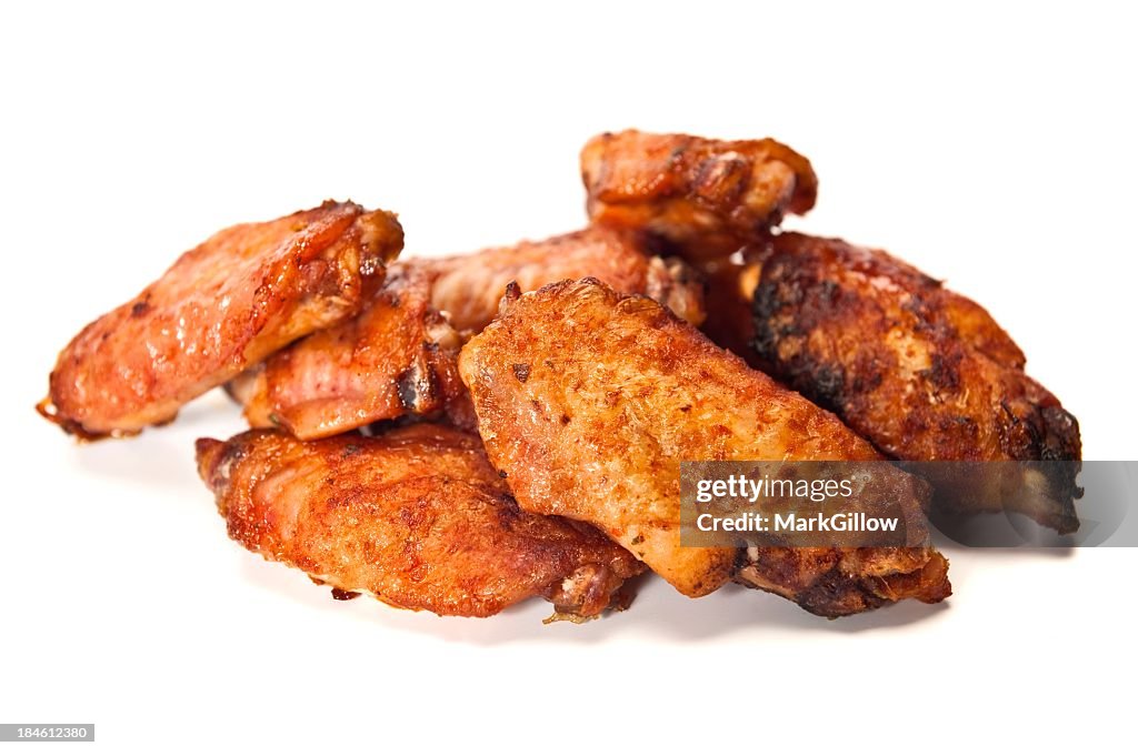 Fried chicken wings on a white background