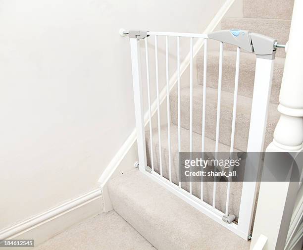 white baby gate - child proof stock pictures, royalty-free photos & images
