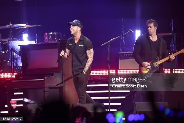 Ryan Tedder, and Zach Filkins of One Republic perform onstage during iHeartRadio KISS108's Jingle Ball 2023 at TD Garden on December 10, 2023 in...