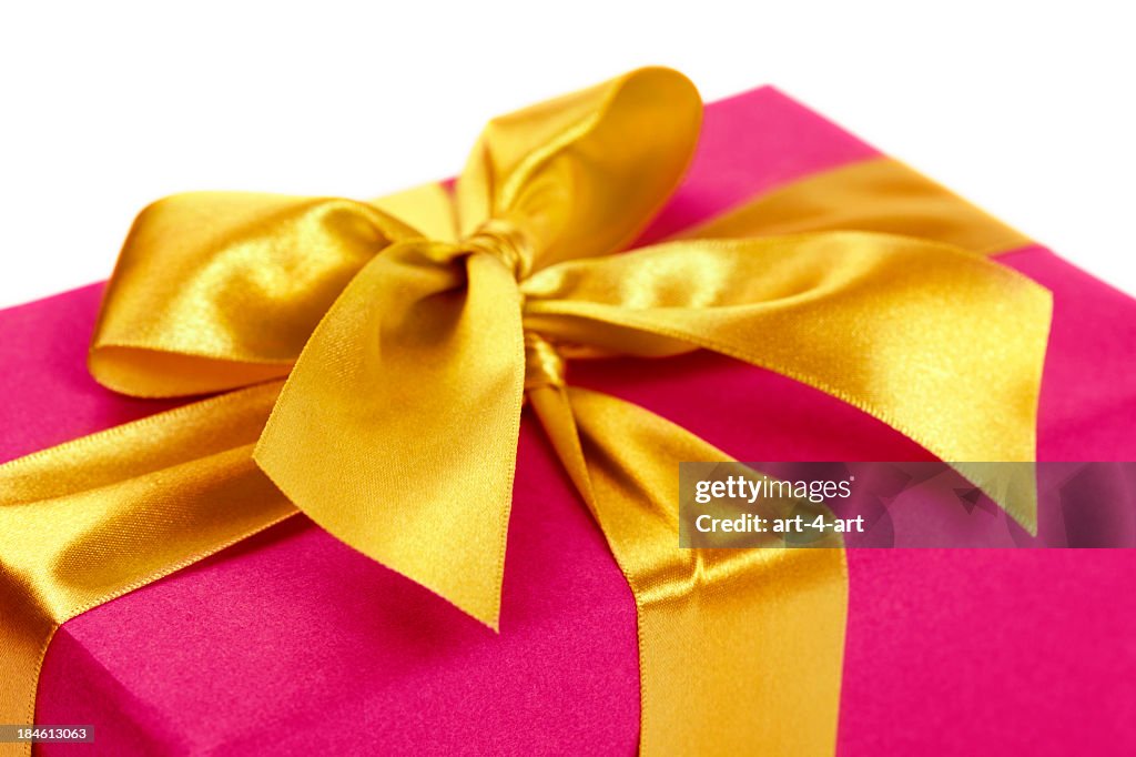 Gift box with golden ribbon