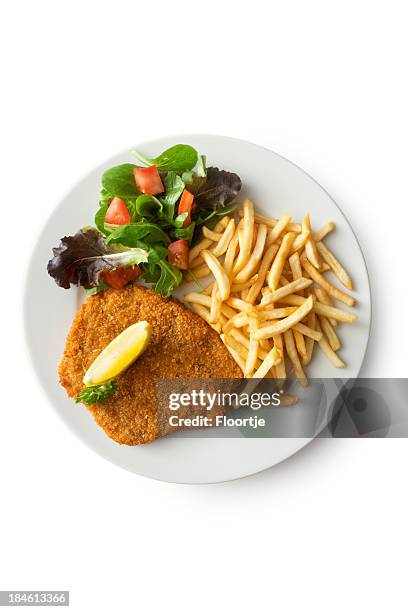 fleisch:  schnitzel und pommes frites und salat - schnitzel stock-fotos und bilder