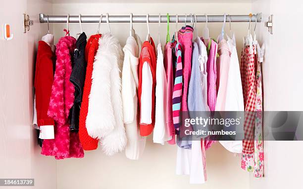 a picture of a close of children clothes - multi colored coat stock pictures, royalty-free photos & images