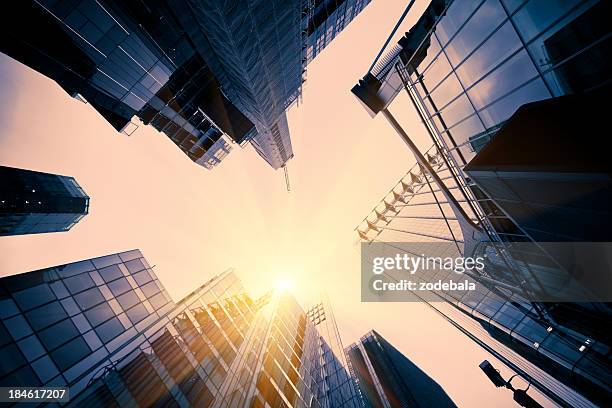 glass tall buildings in financial district - lloyds of london stock pictures, royalty-free photos & images