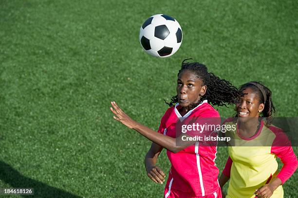 womens soccer - heading the ball stock pictures, royalty-free photos & images