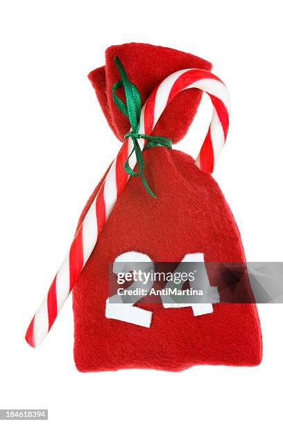 red christmas bag for advent calendar isolated on white - adventkalender stock pictures, royalty-free photos & images