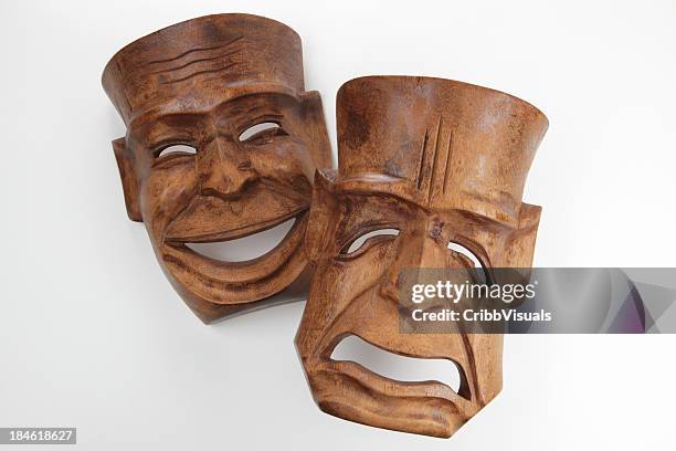 vintage carved wood art, of comedy and tragedy theatre masks - carving stock pictures, royalty-free photos & images