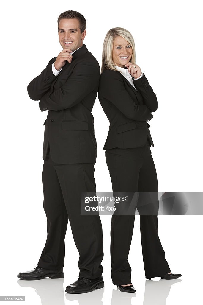 Business couple smiling