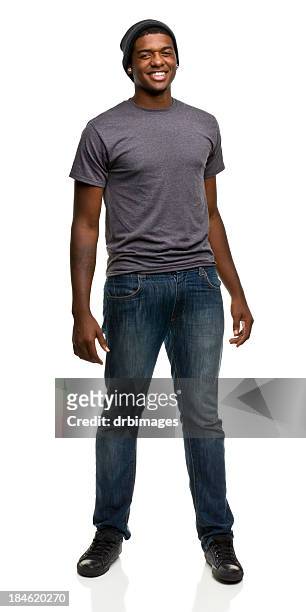 cheerful young man - gray jeans stockfoto's en -beelden