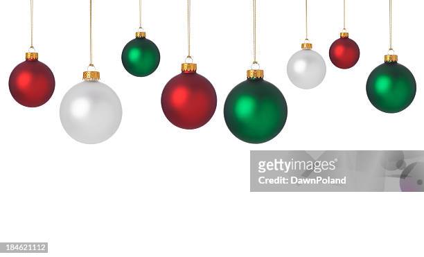 dangling red, green, and white christmas ornaments - kerstversiering stockfoto's en -beelden