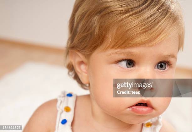 little girl with amblyopia illness - cross eyed stock pictures, royalty-free photos & images