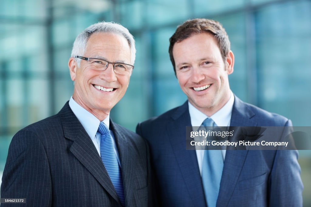 Business men smiling