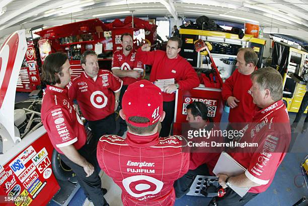 Casey Mears debriefs with his Target Chip Ganassi Racing Dodge Intrepid R/T crew during practice for the NASCAR Winston Cup Daytona 500 on February...