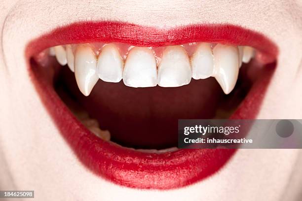 halloween vampire teeth - canine teeth stock pictures, royalty-free photos & images