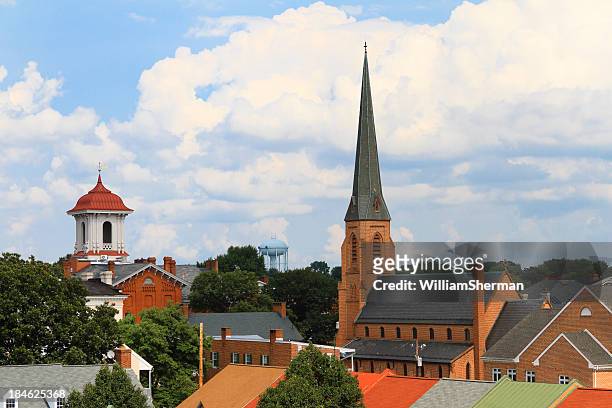 small town steeples and rooftops - spire stock pictures, royalty-free photos & images