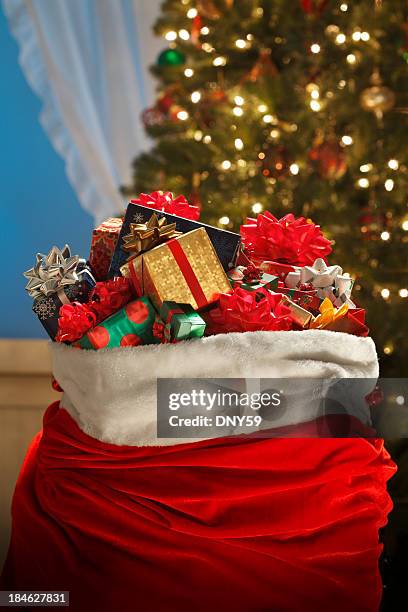 santa bag - christmas toys stock pictures, royalty-free photos & images