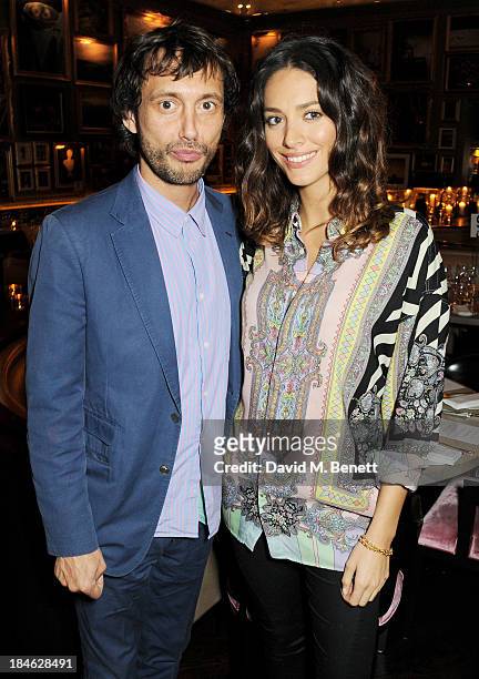 Dan Macmillan and guest attend the London EDITION and NOWNESS dinner to celebrate ON COLLABORATION on October 14, 2013 in London, England.
