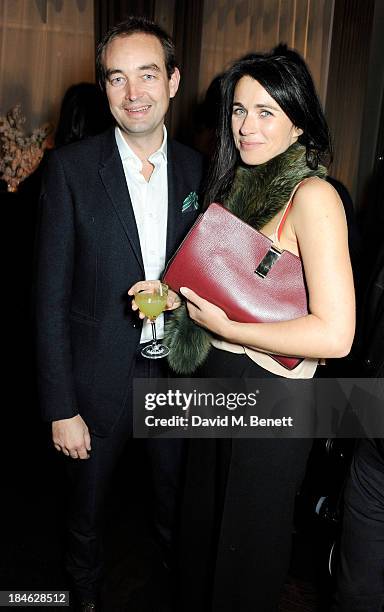 Tom Mullion and Emily Sheffield attend the London EDITION and NOWNESS dinner to celebrate ON COLLABORATION on October 14, 2013 in London, England.