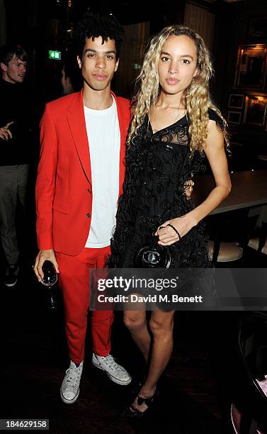 Sean Frank and Phoebe Collings-James attend the London EDITION and NOWNESS dinner to celebrate ON COLLABORATION on October 14, 2013 in London,...