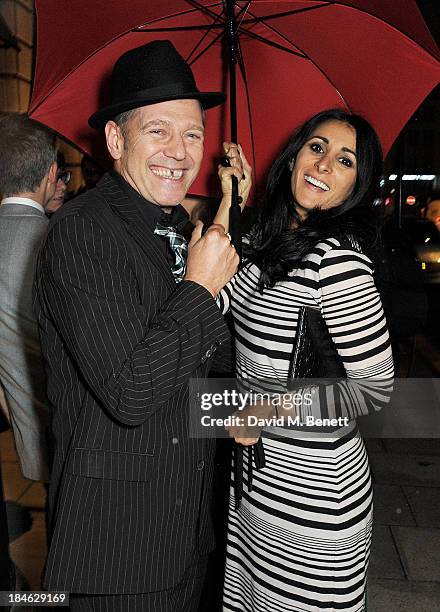 Paul Simonon and Serena Rees attend the London EDITION and NOWNESS dinner to celebrate ON COLLABORATION on October 14, 2013 in London, England.