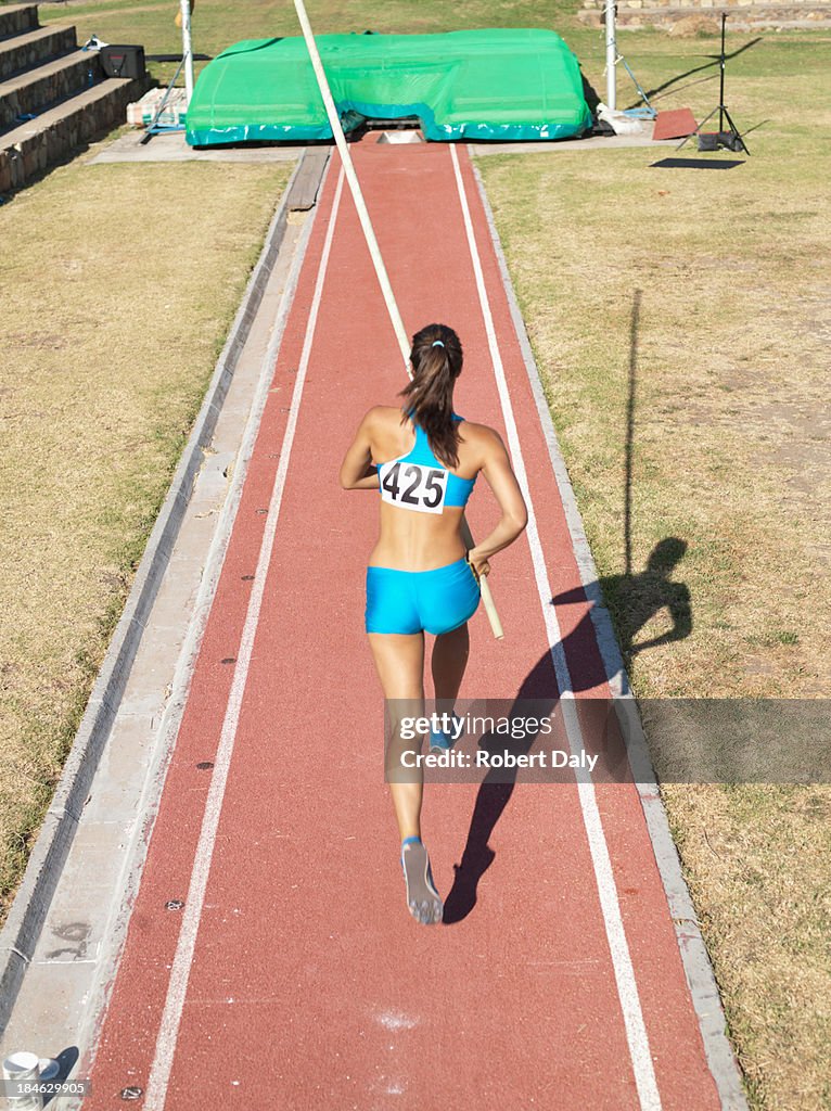 Athlete running to do a pole vault