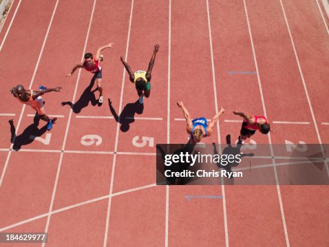 Racers at the start line on a track Racers at the start line on a track