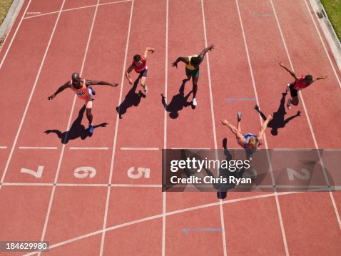 Racers at the start line on a track Racers at the start line on a track
