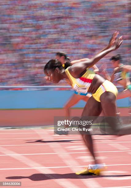 racers on a track  - athlete defeat stock pictures, royalty-free photos & images