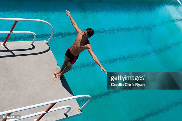 diver standing on diving board - aqua aerobics stockfoto's en -beelden