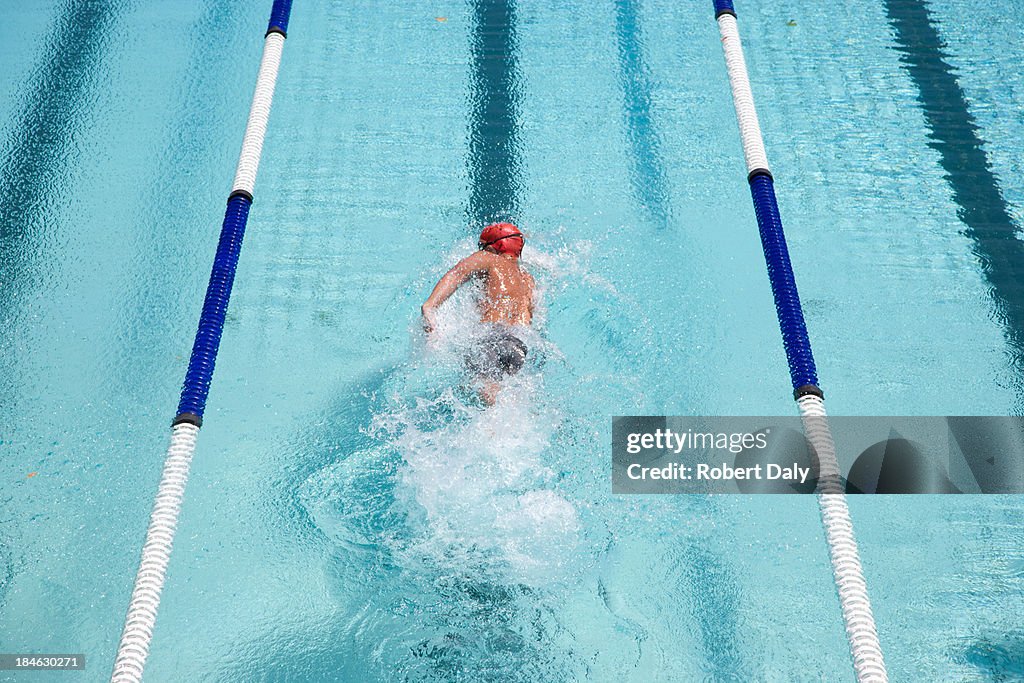 Swimmer swimming in a pool
