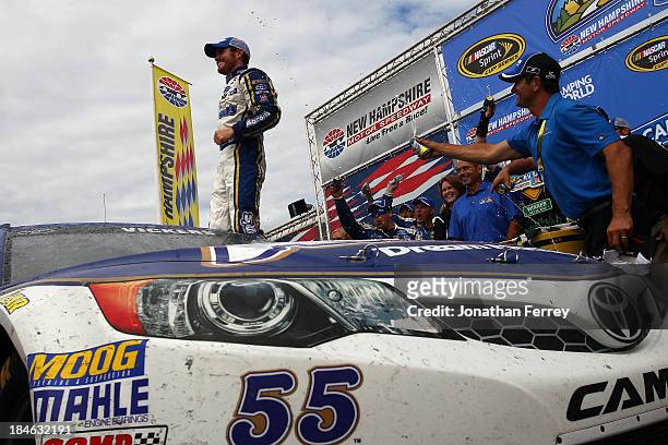 Brian Vickers, driver of the Aaron's Dream Machine Toyota, during the NASCAR Sprint Cup Series Camping World RV Sales 301 at New Hampshire Motor...
