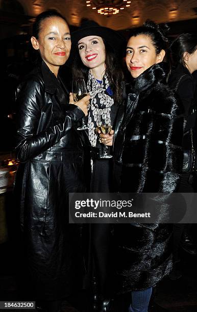 Guest, Lara Bohinc and Mya Turnbull attend the London EDITION and NOWNESS dinner to celebrate ON COLLABORATION on October 14, 2013 in London, England.