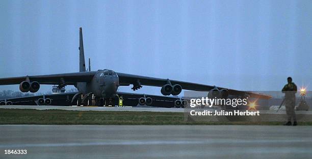 Air Force B-52 bomber is guarded at RAF Fairford March 13, 2003 in Fairford, England. It is widely beleived that the aircraft will take part in any...