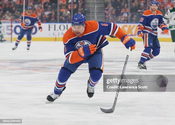 Cody Ceci of the Edmonton Oilers back checking in the first period against the Minnesota Wild on December 8, 2023 at Rogers Place in Edmonton,...