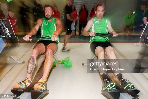 Celebrity chef Jason Roberts and cyclist Shane Kelly compete in the rowing leg of the ANZA Challenge on October 15, 2013 in Wellington, New Zealand.